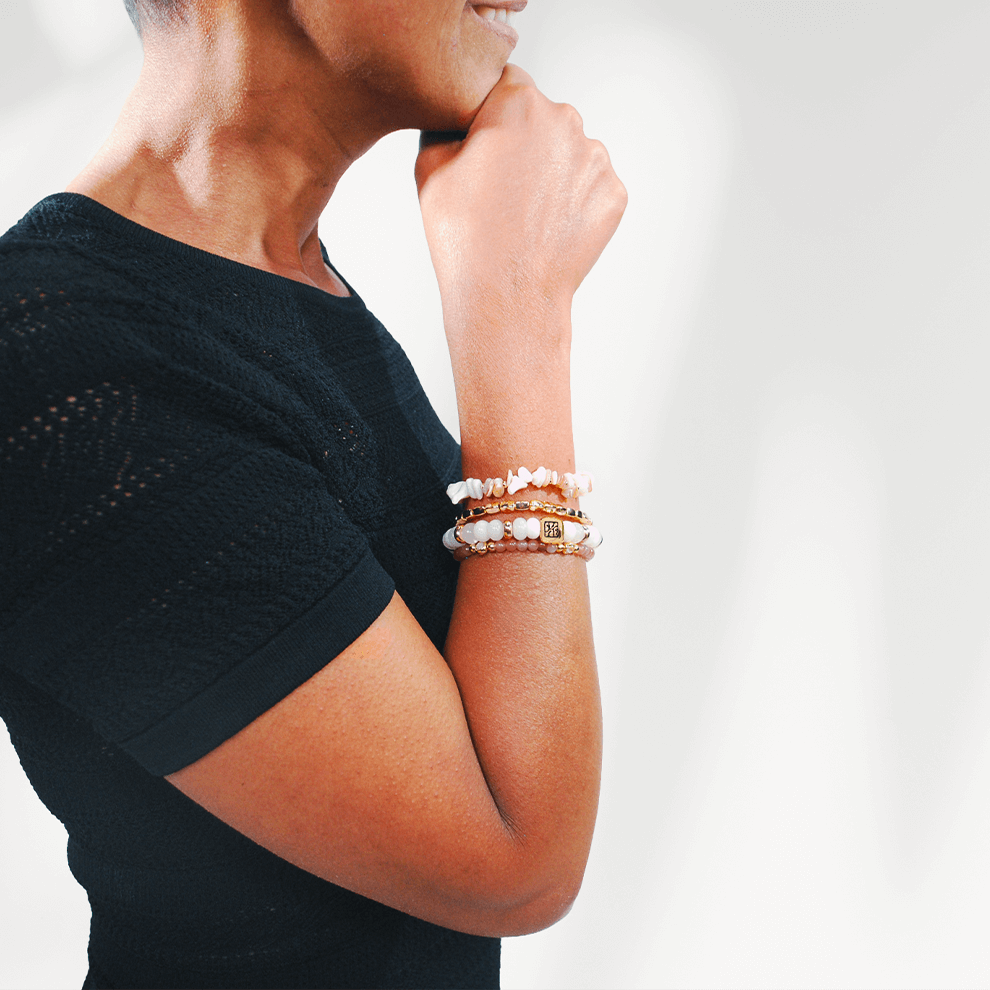 Set van 4 dames armbanden van natuursteen in roze en witte tinten om pols