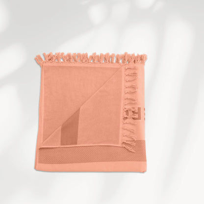 Roze hamamdoek van biologisch katoen van SummerGear met geweven voorkant en badstof achterkant