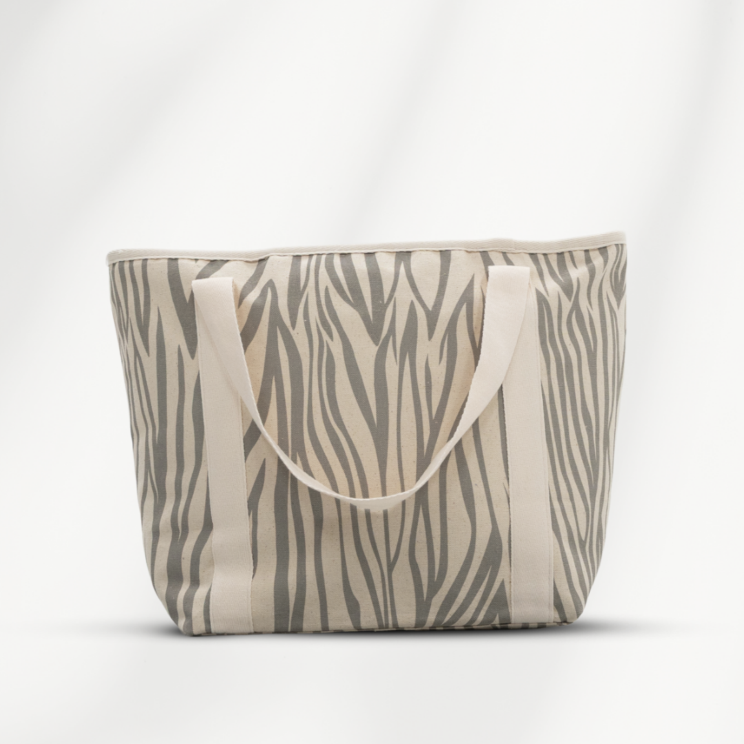 Strandtas met rits Avalon middelgroot die volledig afsuit met rits van  canvas in de kleur naturel en grijs achterzijde