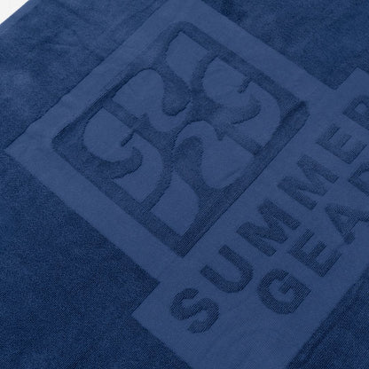 Detail van het blauwe strandlaken van biologisch katoen van SummerGear